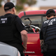 U.S. Immigration and Customs Enforcement officers conducting an arrest in Escondido, California, in July 2019; used here as stock photo.